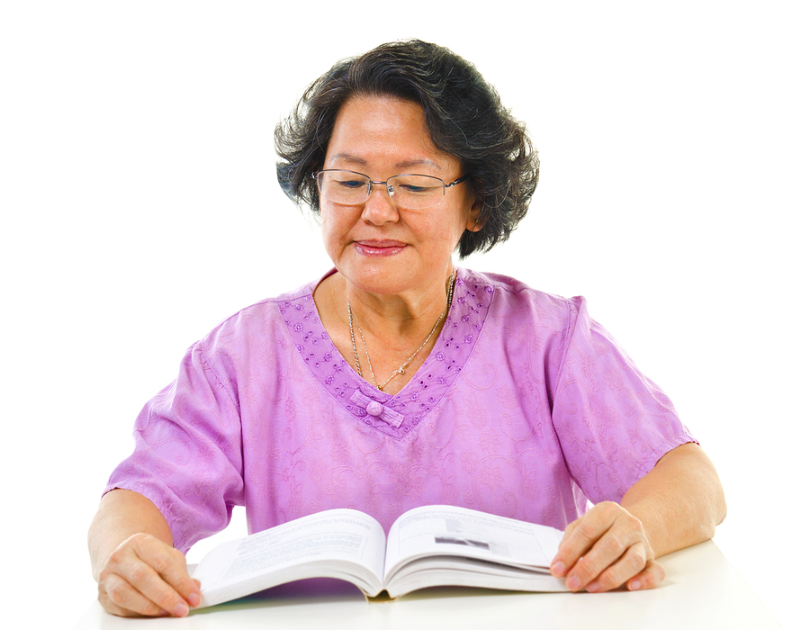 reading asian adults senior woman teach adult literacy serious info